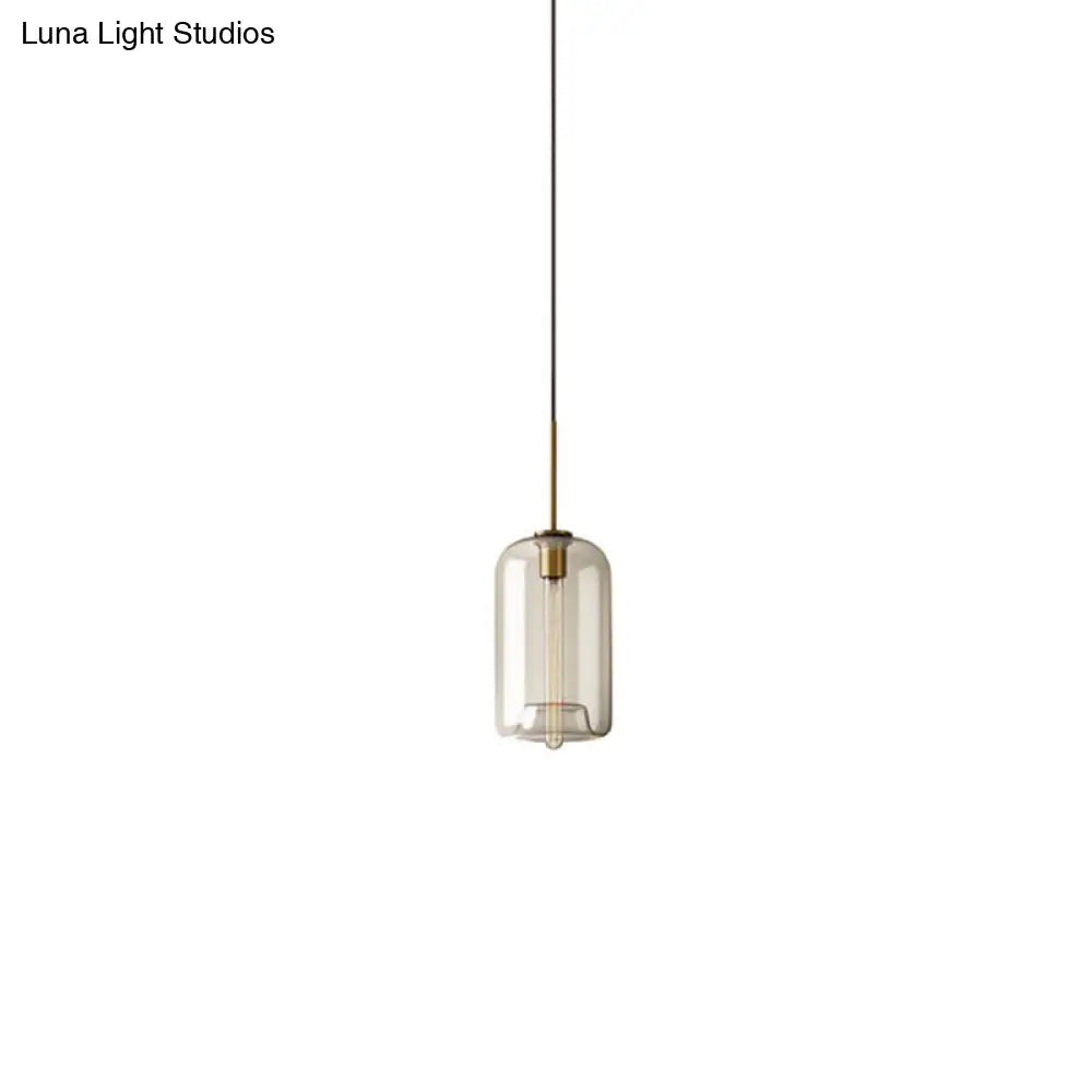 Contemporary Brass Pendant Light With Clear Glass Shade - Oval/Drum/Cylinder 1-Light 7/10/11 Wide /