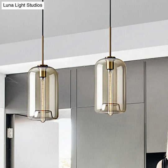 Contemporary Brass Pendant Light With Clear Glass Shade - Oval/Drum/Cylinder 1-Light 7/10/11 Wide