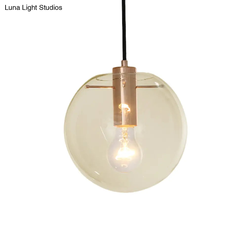 Contemporary Clear/Amber Glass Pendant Light In Rose Gold Finish