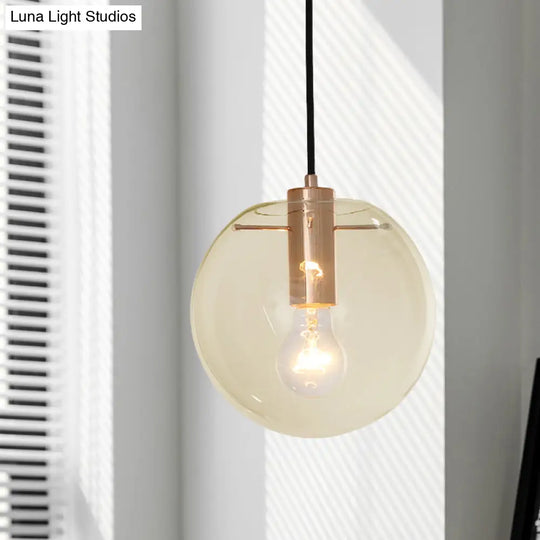 Contemporary Clear/Amber Glass Pendant Light In Rose Gold Finish