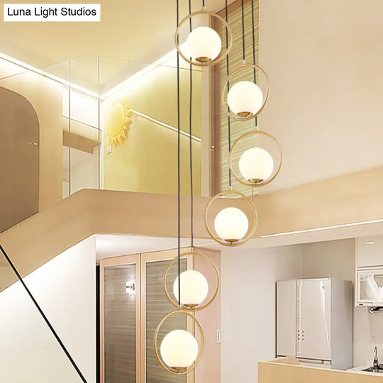 Contemporary Globe Multi Ceiling Lamp With Cream Glass And Black Halo Ring: Staircase Suspension