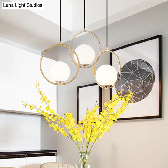 Contemporary Globe Multi Ceiling Lamp With Cream Glass And Black Halo Ring: Staircase Suspension