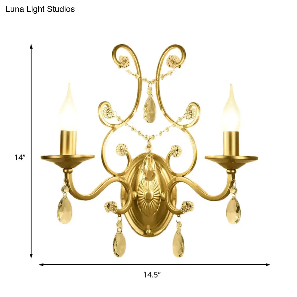 Contemporary Crystal Wall Sconce With Curved Arm And Brass Finish