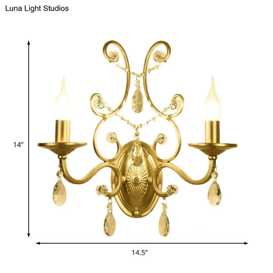 Contemporary Crystal Wall Sconce With Curved Arm And Brass Finish