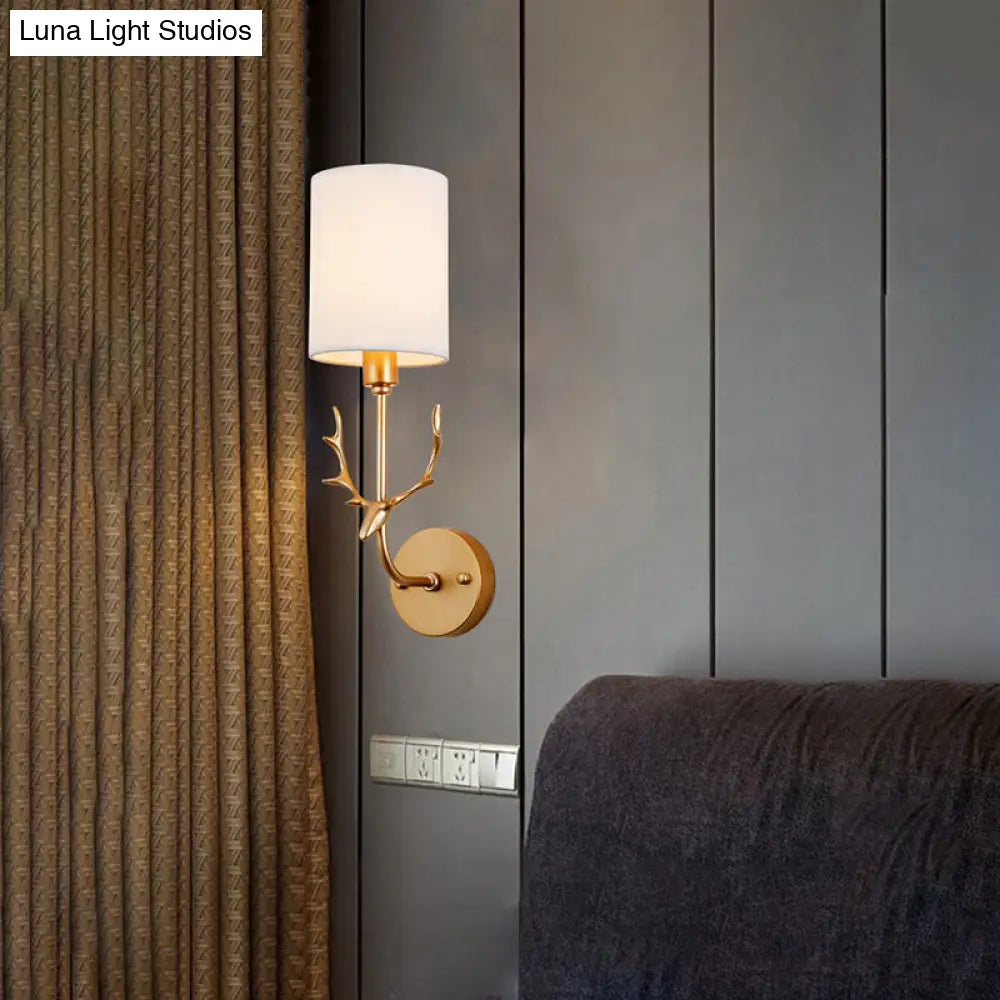 Contemporary Cylinder Wall Sconce With Fabric Shade - Coastal-Inspired Living Room Lighting In