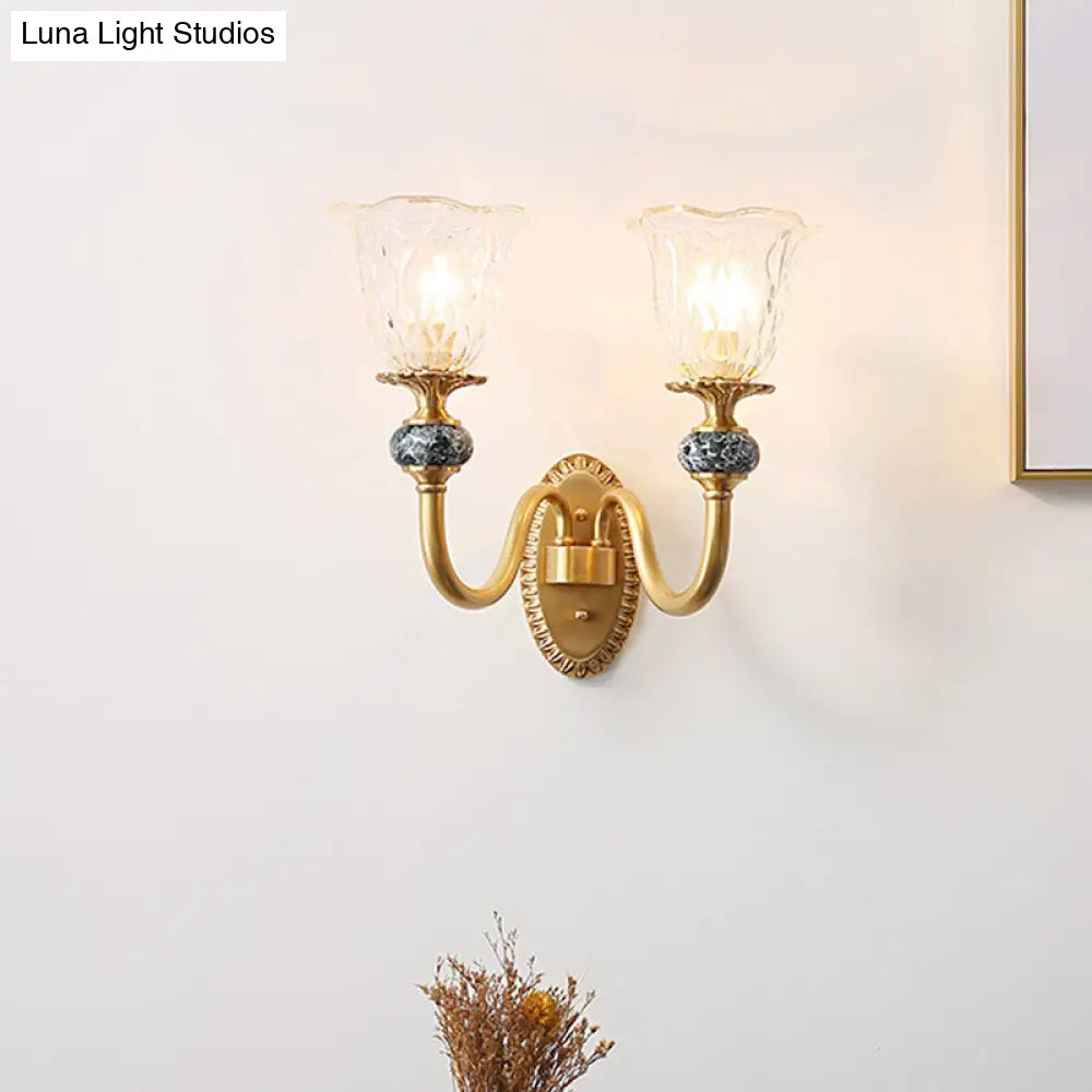 Contemporary Flower Wall Sconce - Clear Glass Lamp In Brass Finish