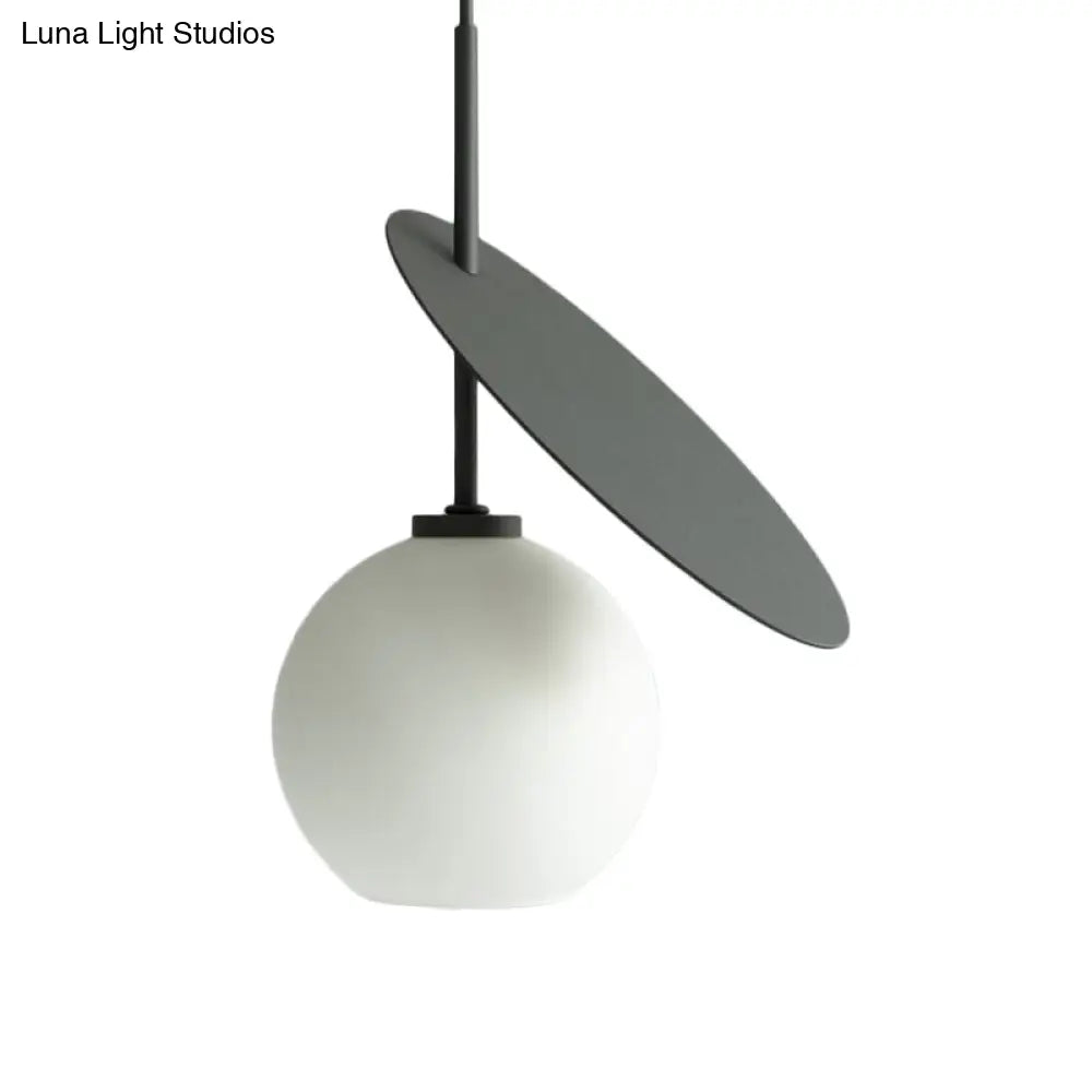 Contemporary Glass Globe Pendant Light With Metallic Circle - Ideal For Restaurants