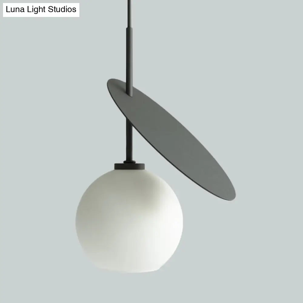 Contemporary Glass Globe Pendant Light With Metallic Circle - Ideal For Restaurants