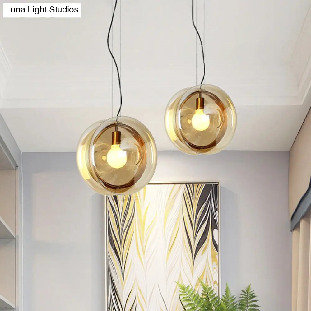 Contemporary Glass Pendant Lamp With Brass Ring - Perfect For Restaurants 1 Head Sphere Light