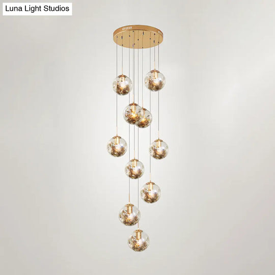 Contemporary Gold Ball Chandelier With Amber Dimpled Glass Pendant Bulbs - 10-Bulb Multi-Light For