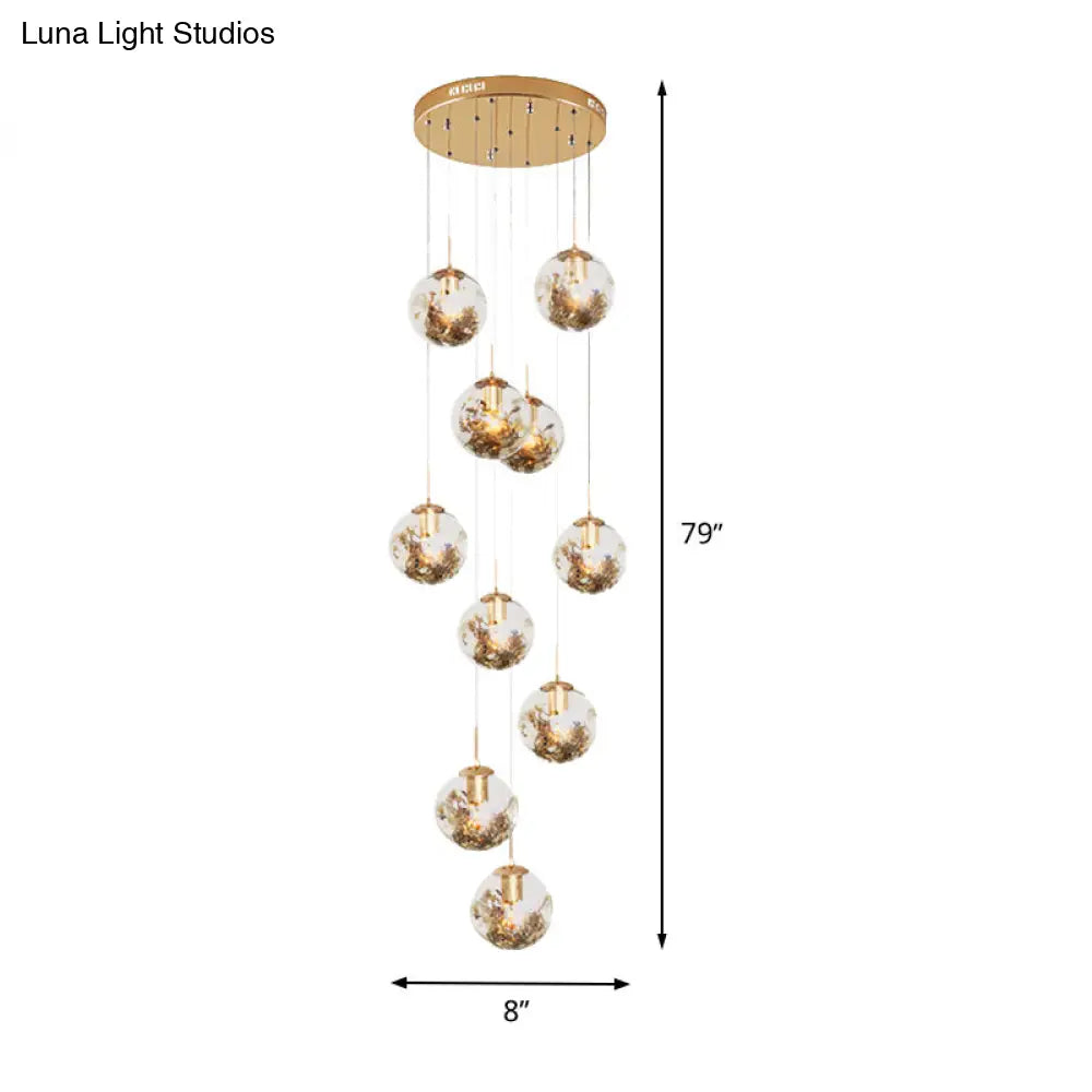 Contemporary Gold Ball Chandelier With Amber Dimpled Glass Pendant - 10 Bulbs Multi-Light For