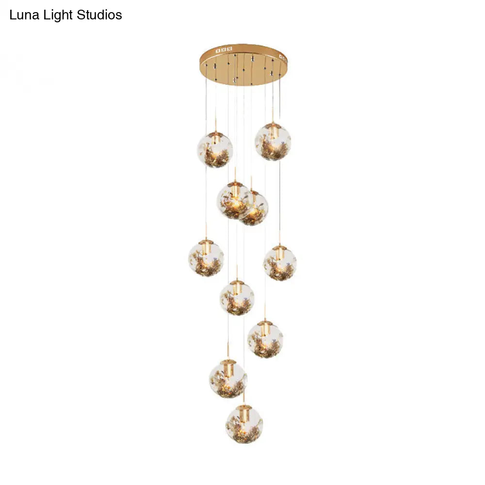 Contemporary Gold Ball Chandelier With Amber Dimpled Glass Pendant Bulbs - 10-Bulb Multi-Light For