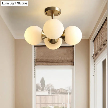Contemporary Gold Ball Semi Flush Ceiling Light With 4 Milky Glass Heads