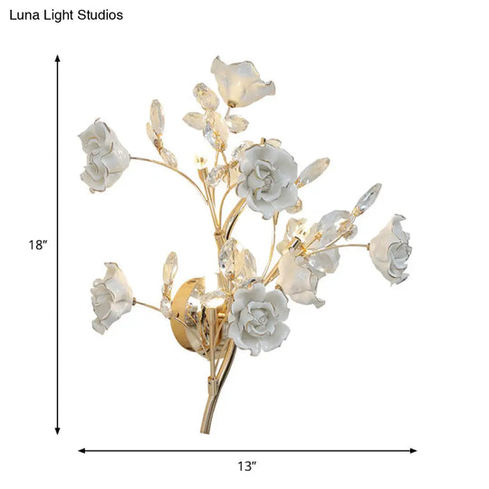 Contemporary Gold Crystal Wall Lamp With Teardrop Faceted Design And Ceramic Flower Accents - 3 Bulb