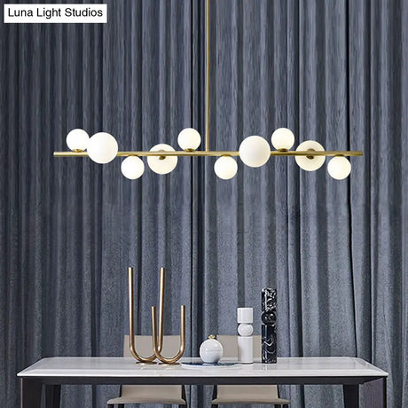 Contemporary Gold Metal Island Pendant Light With Glass Sphere For Dining Table