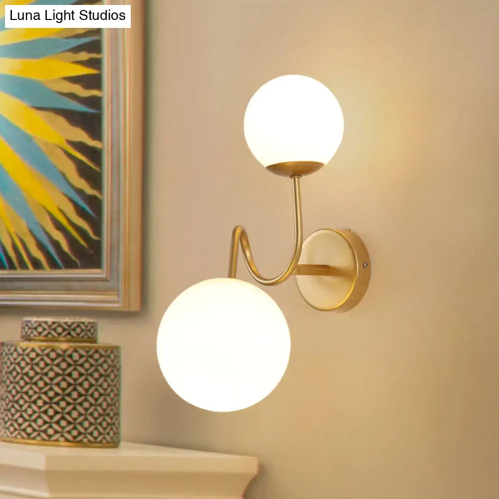 Contemporary Gold Metal Wall Sconce With Curved Arms 2 Heads And White Glass Shade