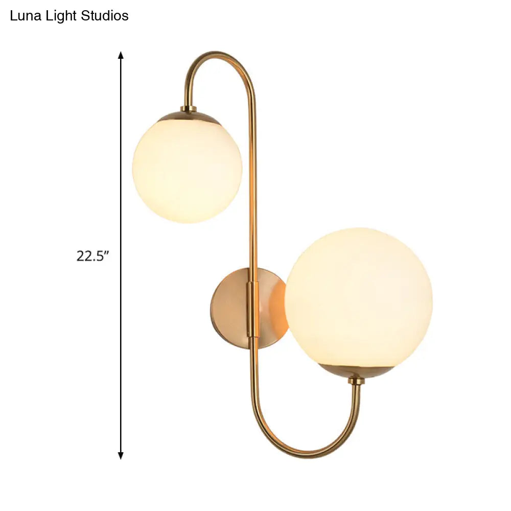 Contemporary Gold Metal Wall Sconce With Opal Glass Shade - 2 Bulb Arm Design