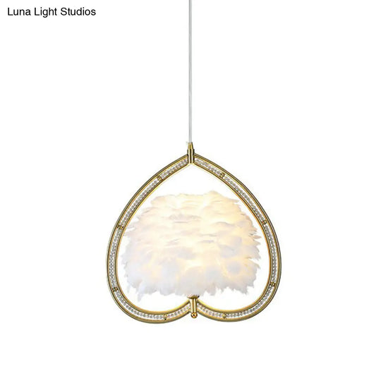 Contemporary Gold Pendant Light With Metallic Heart Suspension And Decorative Feather