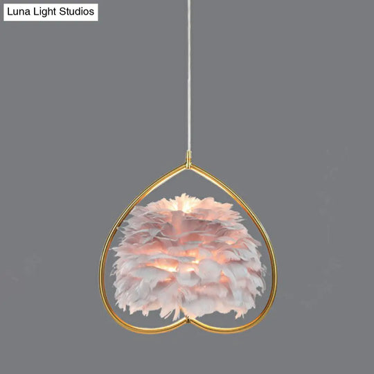 Contemporary Gold Pendant Ceiling Light With Metallic Heart Suspension And Feather Decoration