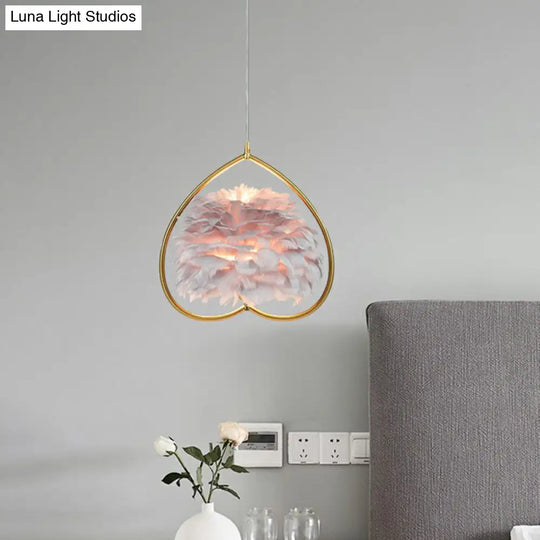 Contemporary Gold Pendant Ceiling Light With Metallic Heart Suspension And Feather Decoration