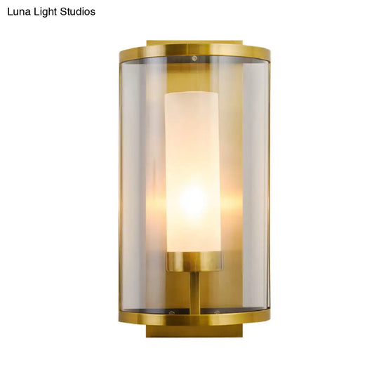 Contemporary Gold Wall Sconce With Clear Glass Shade