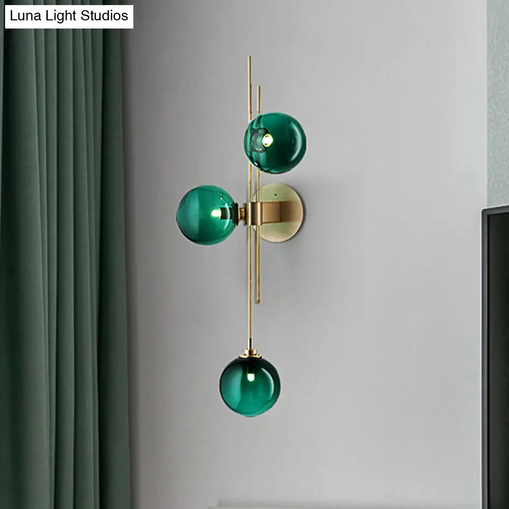 Contemporary Green/Clear Glass Globe Wall Sconce Lamp With 3 Lights In Brass