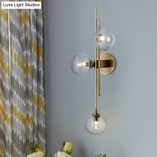 Contemporary Green/Clear Glass Globe Wall Sconce Lamp With 3 Lights In Brass