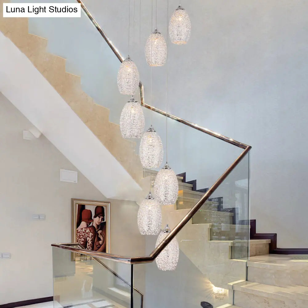 Contemporary Metallic Egg-Shaped Stair Pendant With 8 Bulbs Silver Hanging Lamp