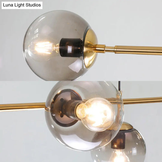 Contemporary Smoke Gray Glass Globe Hanging Light Fixture - 6 Head Gold Island