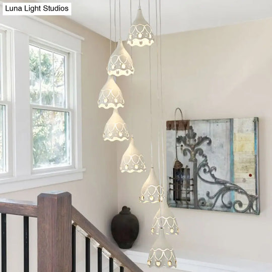 Contemporary Spiral Ceiling Light With 8 White Iron Lights And Carved Design For Stairs