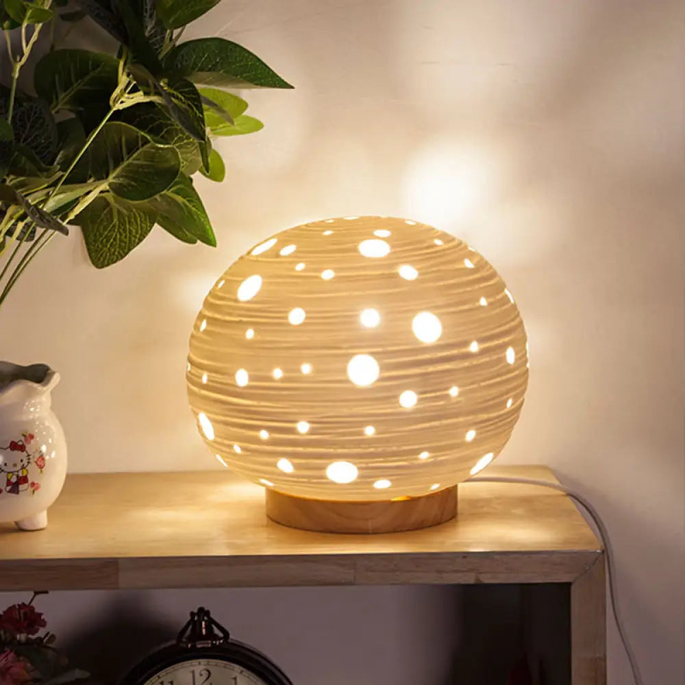 Contemporary White Desk Lamp - Laser-Cut Ball Ceramics Shade 1 Head Night Table Light