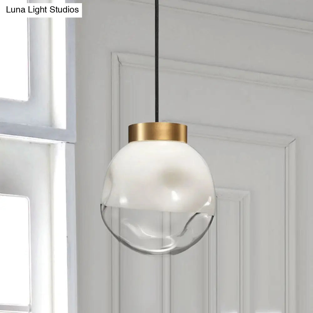 Modern Globe Pendant Light With Dimpled Glass In White And Clear Brass Finish