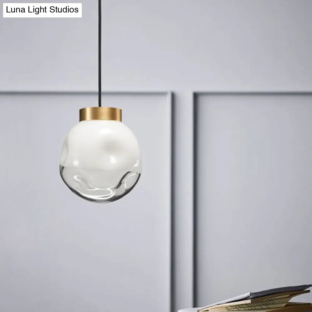 Modern Globe Pendant Light With Dimpled Glass In White And Clear Brass Finish