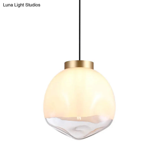 Modern Globe Pendant Light With Dimpled Glass In White And Clear Brass Finish