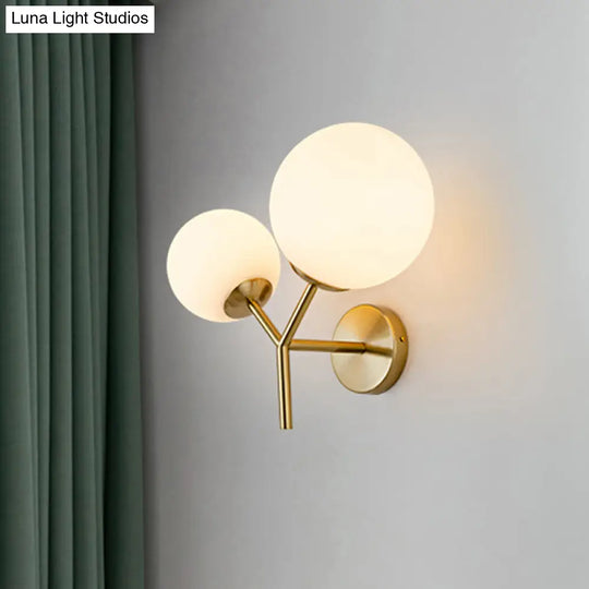 Contemporary White Glass Spherical Sconce With 2 Gold Heads - Wall Mounted Light Fixture