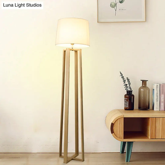 Contemporary Wood Trapezoid Floor Lamp With White Barrel Fabric Shade