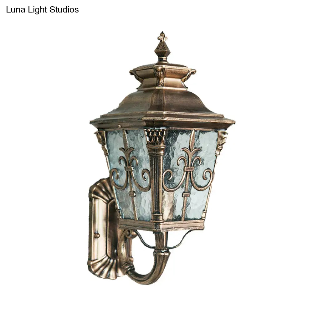 Country Brass Outdoor Wall Sconce With Pointed Flower Design