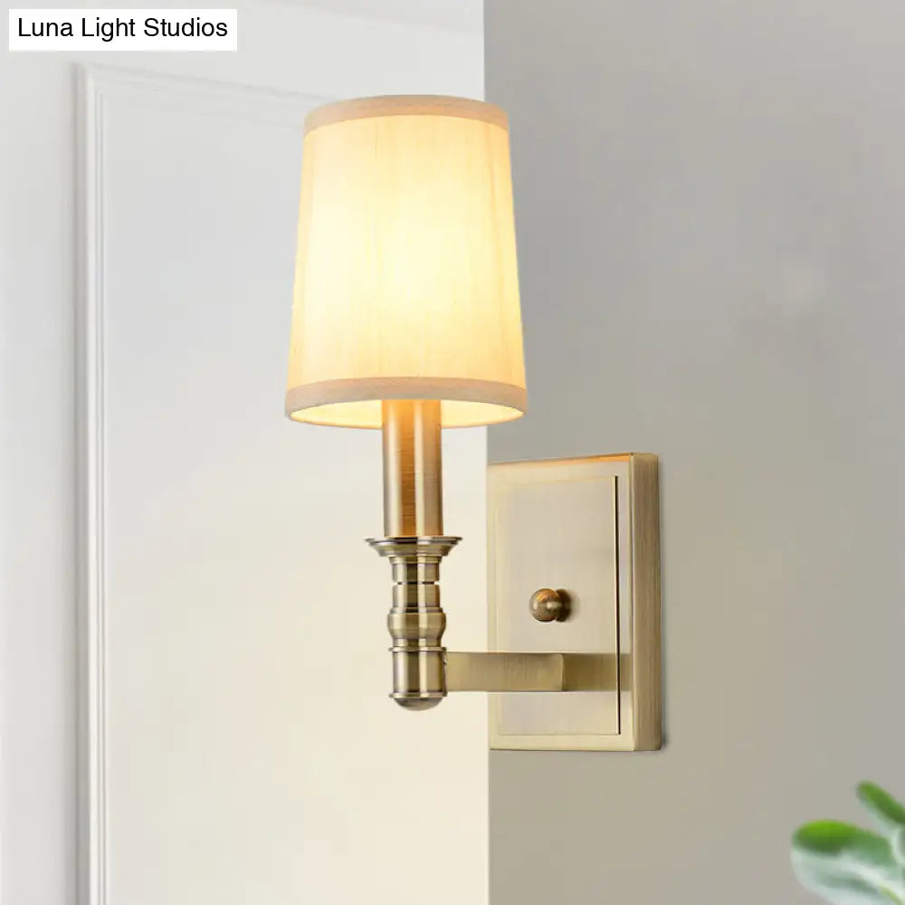 Country Corridor Wall Light Fixture With Brass Frame And Cylinder Fabric Shade