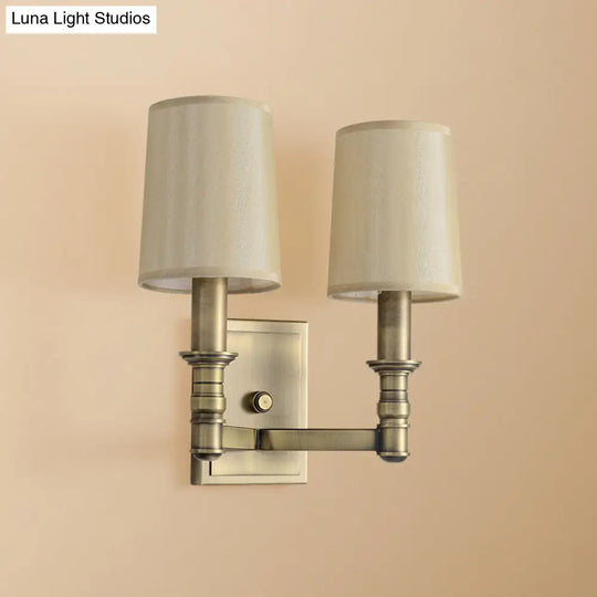 Country Corridor Wall Light Fixture With Brass Frame And Cylinder Fabric Shade