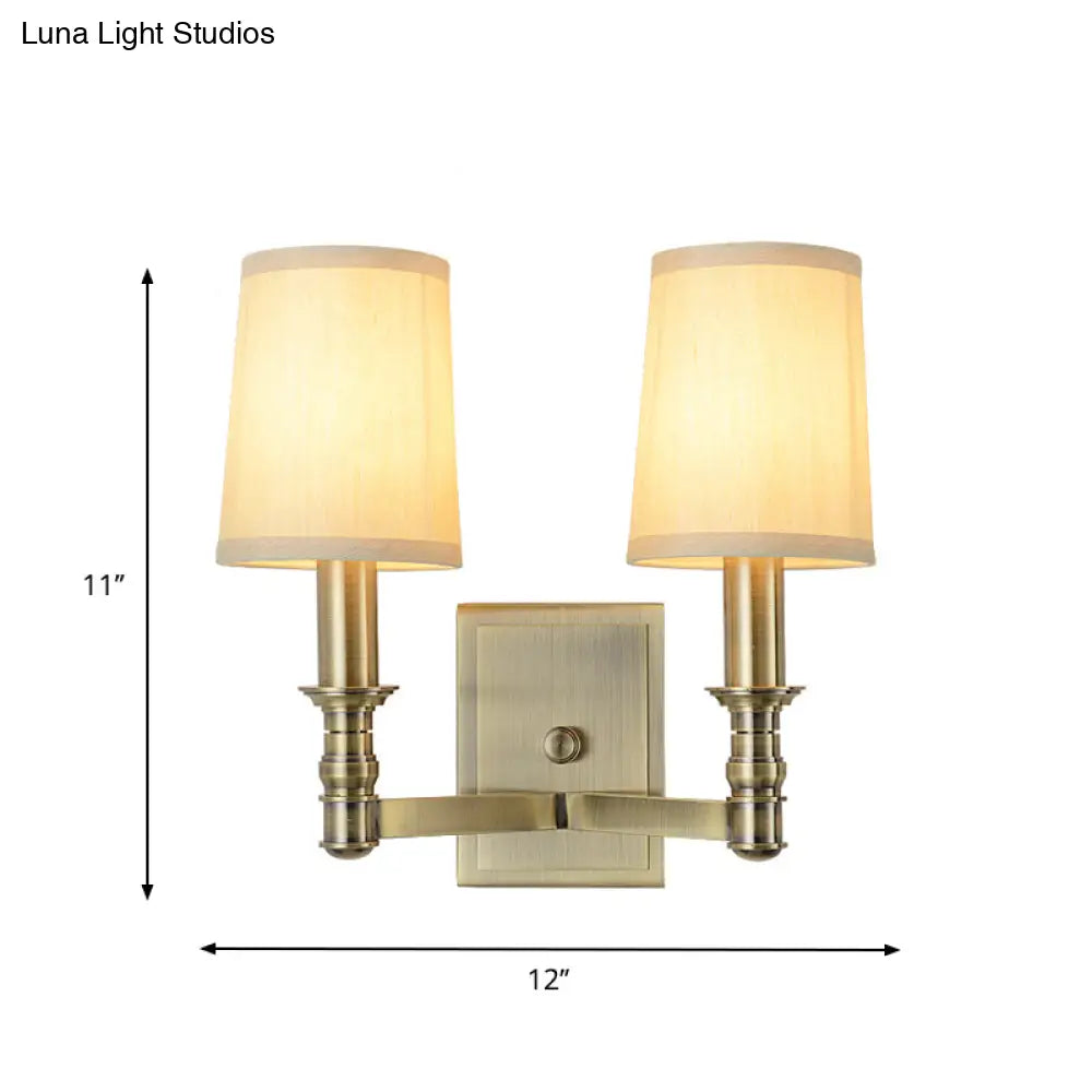 Country Corridor Wall Light Fixture With Brass Frame And Cylinder Fabric Shade