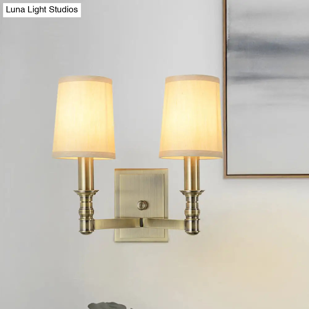 Country Corridor Wall Light Fixture With Brass Frame And Cylinder Fabric Shade