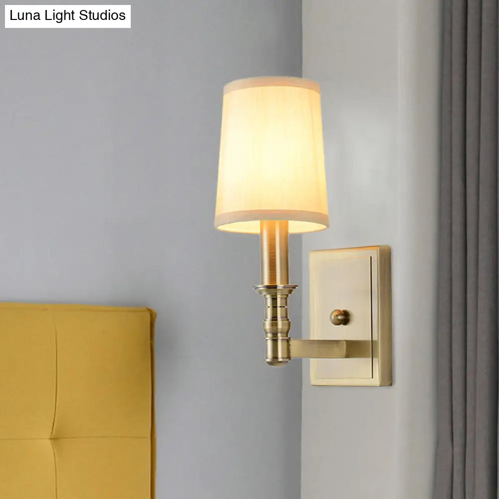 Country Corridor Wall Light Fixture With Brass Frame And Cylinder Fabric Shade