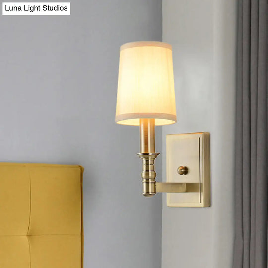 Country Corridor Wall Light Fixture With Brass Frame And Cylinder Fabric Shade