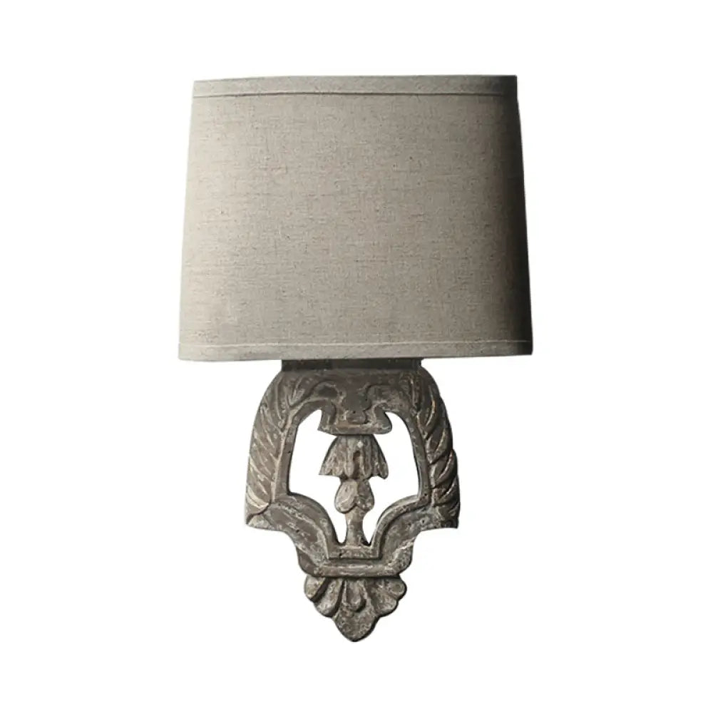 Country Style 1-Light Fabric Wall Sconce With Carved Backplate - Brown Finish