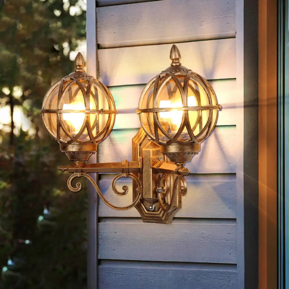 Country Style Black/Bronze Spherical Wall Lighting With Amber Glass - 2-Bulb Patio Surface Sconce