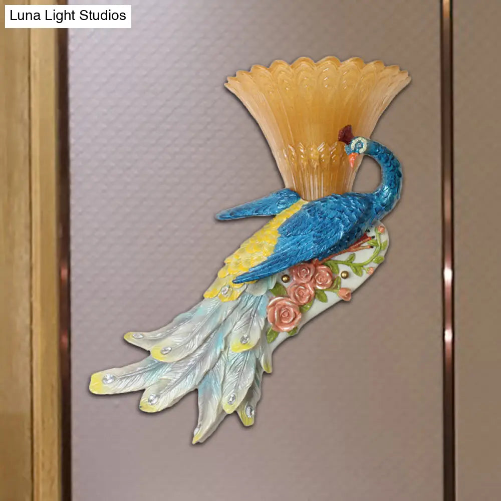 Country Style Flared Wall Sconce With Blue Peacock Design - 1 Bulb Amber Glass And Resin Lighting