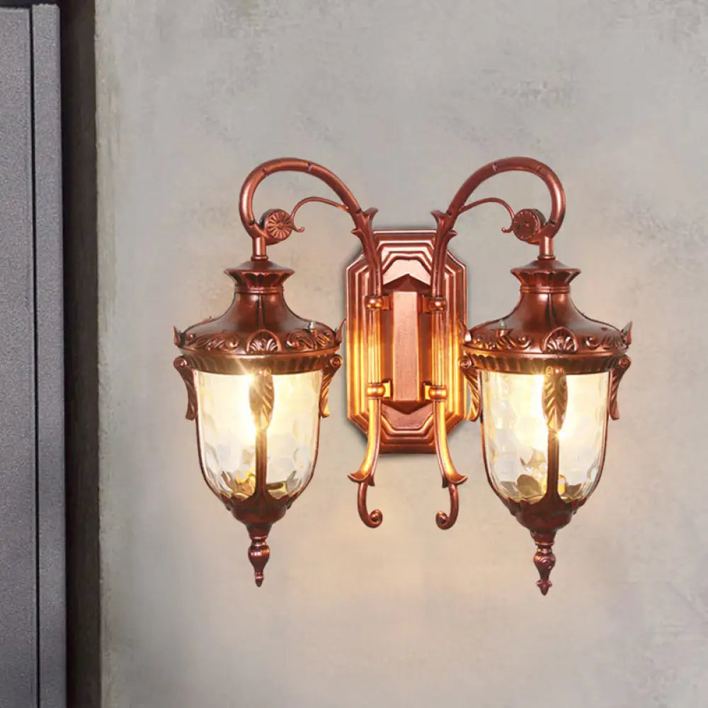 Countryside Black/Gold-Copper Urn Wall Sconce Light With Clear Glass - 2 Bulbs Copper