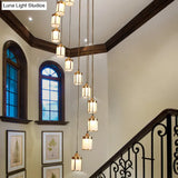 Cylindrical Multi-Ceiling Artistic Light with Frost Glass and Brass Suspension for Staircases