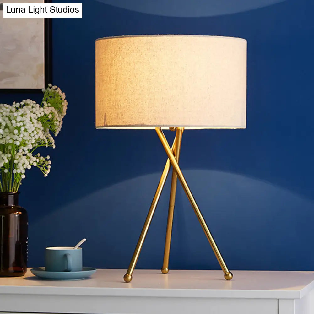 Drum Shaped Table Lamp With Metallic Tripod: Artistic Nightstand Light