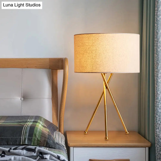 Drum Shaped Table Lamp With Metallic Tripod: Artistic Nightstand Light